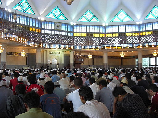 Friday prayer inside the main prayer hall of Masjid Negara mosque in Kuala Lumpur, Malaysia (2009).