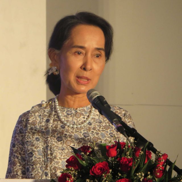 Burmese politician and Nobel Peace Prize laureate Aung San Suu Kyi addresses a room of journalists at the International Media Conference in Yangon, Burma on March 9, 2014