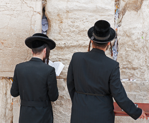 Two haridi men at the western wall of mourning in Jerusalem, Israel.