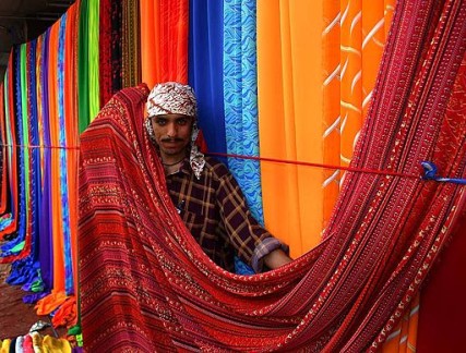 Sunday textile market on the sidewalks of Karachi, Pakistan.