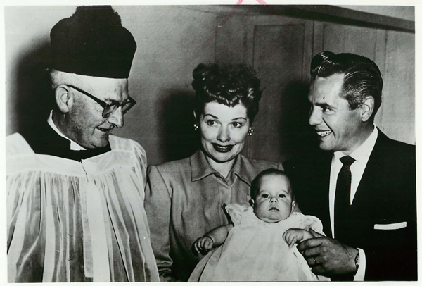 (1953) Television stars Lucille Ball and husband, Desi Arnaz, hold 10-week-old Desiderio Alberto Arnaz, after he was baptized by Father John Hurley of Our Lady of the Valley Catholic Church near Hollywood, Calif. The infant attracted nation-wide interest when he was born on the same day that 