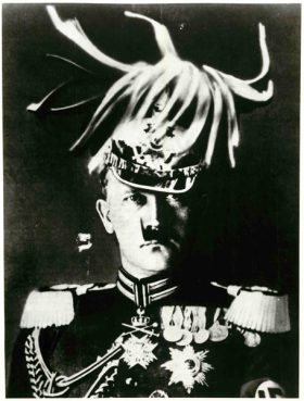 This image of Adolf Hitler was featured in an exhibit titled "His Majesty Adolf" at New York's Jewish Museum in 1980. The montage was created by John Hearfield, and included black and white images designed during the 1930's mainly for the covers of 'Arbeiter-Illustrierte-Zeitung,' a leftist newspaper. Religion News Service file photo