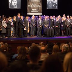 Clergy and politicians gather on stage to pray during an interfaith "Service of Unity & Hope" to remember three shooting victims on Thursday (April 17) at the Jewish Community Center of Greater Kansas City in Overland Park, Kan. Religion News Service photo by Sally Morrow