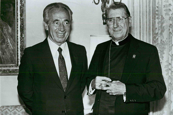 Then Israeli Prime Minister Shimon Peres, left, and New York's Cardinal John O'Connor met on Sept. 19, 1986 at the cardinal's residence in New York. Religion News Service file photo by Chris Sheridan