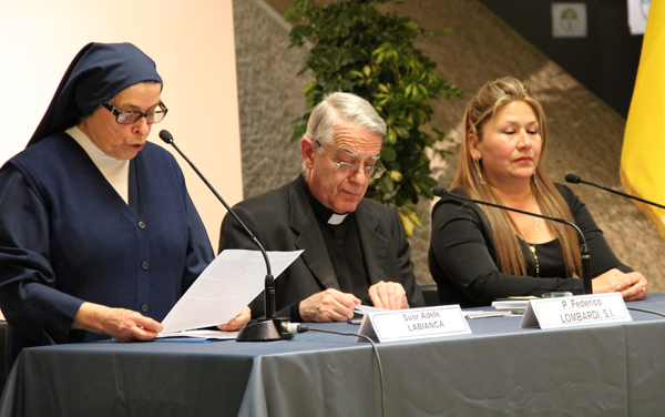 Left to right, Sister Adele Labianca, Father Federico Lombardi and Floribeth Mora Diaz - who claims she survived a brain aneurism due to Pope John XXIII's intervention - attend a press conference on Thursday, April 24. RNS photo by Josephine McKenna