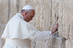 Pope Francis prays at the Western Wall in Jerusalem.