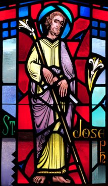 Stained glass image of St. Joseph the Worker.