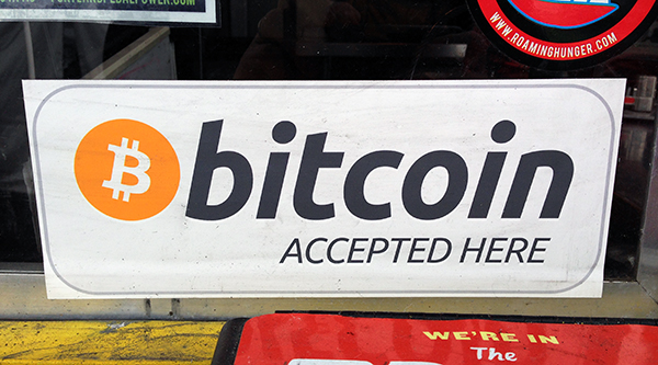 Bitcoin, a digital currency system, has spread from being accepted at small businesses, such as Portland's Whiffy's Fried Pies, to educational institutions, such as King's College in New York, which announced June 13 that it would become the first accredited U.S. college to accept the digital currency.