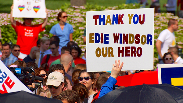 A same-sex marriage supporter pays tribute to Edie Windsor's contributions following the Supreme Court's decision on DOMA in 2013.