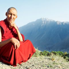 A Tibetan monk. Our story below refers to Colorado monks. But if you squint, Tibet kind of looks like Colorado. Image by Dmitry Kalinovsky via Shutterstock.