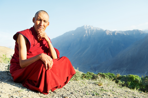 A Tibetan monk. Our story below refers to Colorado monks. But if you squint, Tibet kind of looks like Colorado. Image by Dmitry Kalinovsky via Shutterstock.