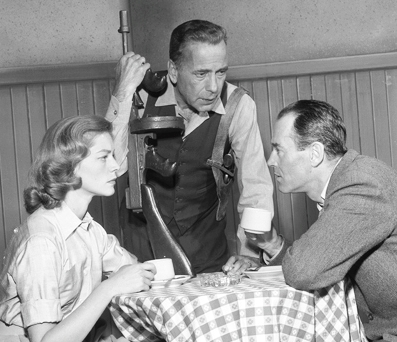 Actors Lauren Bacall, Humphrey Bogart and Henry Fonda in a scene from the television broadcast play "Petrified Forest", 1955.