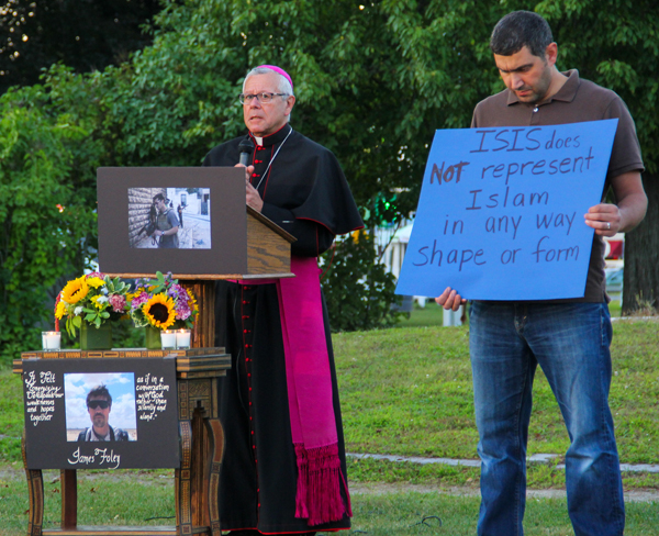 Bishop Peter Anthony Libasci of Manchester, N.H., speaks during a vigil on Saturday (Aug. 23) for slain journalist James Foley at the Rochester Commons in Rochester, N.H. Shawn St.Hilaire / Democrat Photo