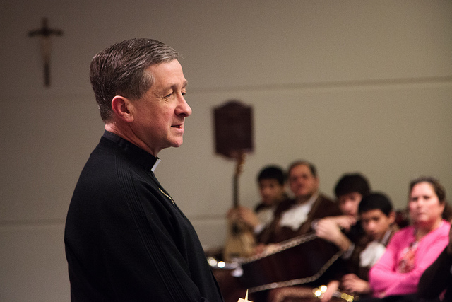 Bishop of Spokane, Blase Cupich, welcomes Fast for Families on March 6, 2013, during an evening community meeting at Gonzaga University. 
