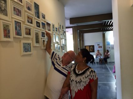 Marlene and Vittorio Ishak, point out their wedding photograph displayed prominently at the Beit Daniel Reform synagogue in Tel Aviv. Marlene, 53 married her husband Vittorio, 81 at a civil ceremony in Cyprus in 2002. Today they are jointly attending a Introduction to Judaism course, part of the Temple's conversion process. Photo by Jacob Wirtschafter