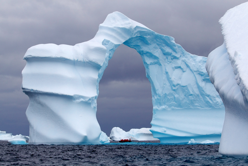 A huge arch-shaped iceberg.