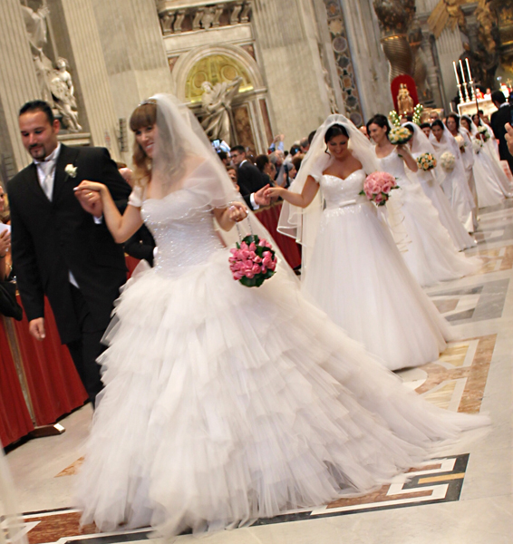 Pope Francis officiated at the weddings of 20 couples at St. Peter’s Basilica in September 2014. Religion News Service photo by Cathleen Falsani