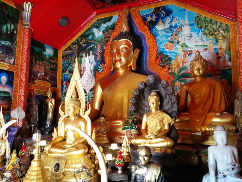 Gilded statues and brightly painted walls narrate and depict important events in the Buddha’s life. Religion News Service photo by Brian Pellot, 26 October 2014.