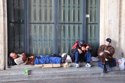 A group of homeless men sleep just outside of St. Peter's Square at the Vatican on Thursday (Nov. 13, 2014).  Religion News Service photo by Josephine McKenna