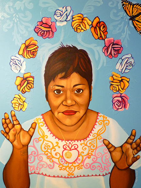 This self-portrait by artist Alma Lopez features images of change central to most of her works - butterflies, roses and wings. Religion News Service photo by Kimberly Winston
