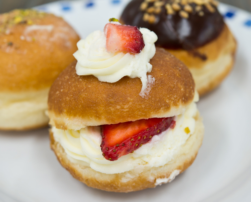 Sufganyiot -- or donuts, in Hebrew. They are one of the oil-rich foods eaten during Hanukkah, the Jewish Festival of Lights, to remember the story of how the ancient Maccabees had oil enough to light the menorah for one night, but it miraculously lasted for eight. 