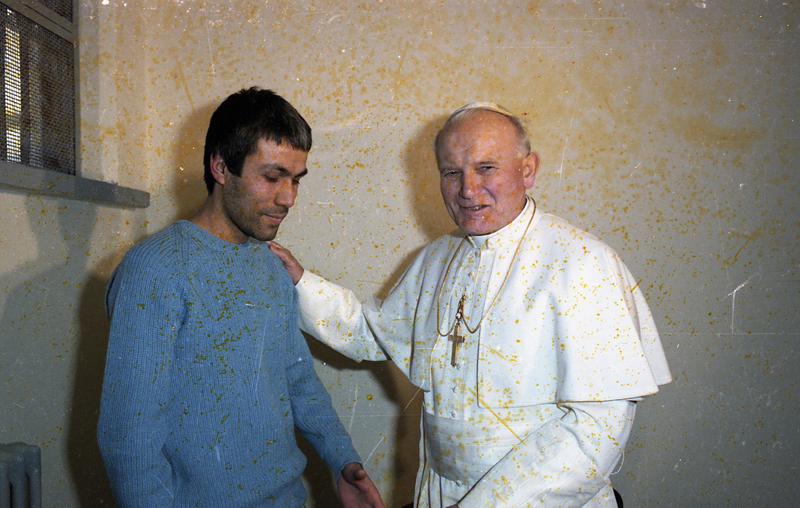 This is a scan of a badly deteriorated negative of Pope John Paul II meeting his would-be assassin, Mehmet Ali Agca, in a Rome prison on Dec. 27, 1983. Photo by Paul Haring, courtesy of Catholic News Service
