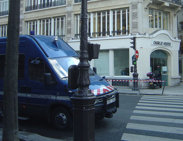 Police vehicles were placed outside of the Charlie Hebdo building in 2006 to prevent possible protest over a cartoon.