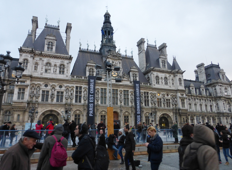 Banners hang on Paris City Hall supporting Charlie Hebdo. Religion News Service photo by Elizabeth Bryant