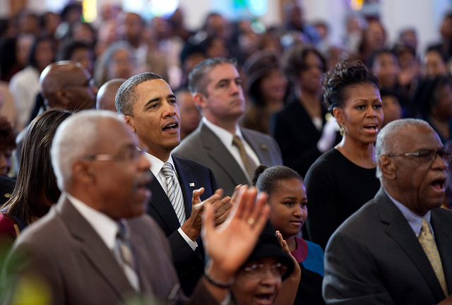 President Barack Obama, First Lady Michelle Obama, and daughters Malia (partially seen at left) and Sasha attend church services at Zion Baptist Church in Washington, D.C.,  on Sunday, Jan. 15, 2012. (Official White House Photo by Pete Souza)