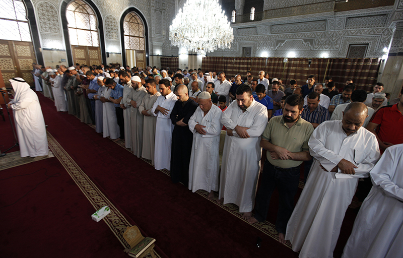 Sunni worshippers attend prayers at a Sunni mosque during Eid al-Fitr in Baghdad July 28, 2014. Photo courtesy of REUTERS/Ahmed Saad *Editors: This photo may only be republished with RNS-SUNISHIITE-SPLAINER, originally transmitted on February 18, 2015