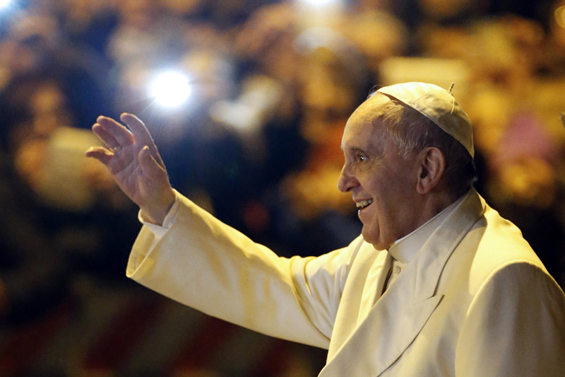 Pope Francis waves as he leaves after visiting the parish of San Michele Archangelo in Rome February 8, 2015. Photo courtesy of REUTERS/Giampiero Sposito. * Editors: This photo can only be used with RNS-VATICAN-REFORM, transmitted on Feb. 9, 2015 or with RNS-POPE-ITINERARY, originally transmitted on June 30, 2015.