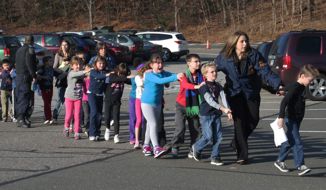 Children outside Sandy Hook Elementary School the day of the shooting