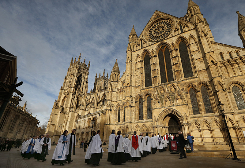 Members of the clergy enter York Minster before a service to consecrate Reverend Libby Lane as the first female bishop in the Church of England, in York, northern England on January 26, 2015. Photo courtesy of REUTERS/Phil Noble *Editors: This photo may only be republished with RNS-GREER-COMMENTARY, originally transmitted on March 25, 2015.