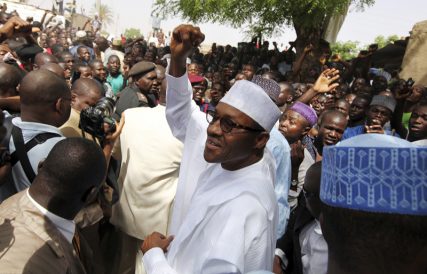 Nigeria's president-elect Muhammadu Buhari gestures to supporters as he arrives to cast his ballot at Daura, in Katsina state in northern Nigeria, on April 16, 2011. REUTERS/Afolabi Sotunde
