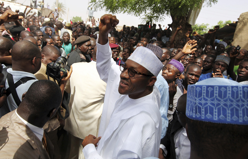 Nigeria's president-elect Muhammadu Buhari gestures to supporters as he arrives to cast his ballot at Daura, in Katsina state in northern Nigeria, on April 16, 2011. Photo courtesy of REUTERS/Afolabi Sotunde
*Editors: This photo may only be republished with RNS-NIGERIA-MUSLIM, originally transmitted on May 27, 2015.