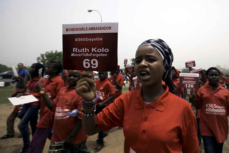 A girl holds a sign during a march on April 14, 2015, in Abuja, Nigeria, to mark the one-year anniversary of the kidnapping of more than 200 schoolgirls from a secondary school in Chibok by Boko Haram militants. Photo courtesy of Reuters/Afolabi Sotunde 
*Editors: This photo may only be republished with RNS-NIGERIA-GIRLS, originally transmitted on April 14, 2015.