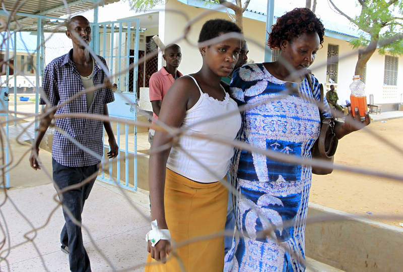  A woman is escorted by her mother to the wards after hiding for three days at her university in Garissa where gunmen killed students. Photo courtesy of REUTERS/Noor Khamis
*Editors: This photo may only be republished with RNS-SALKIN-COLUMN, originally transmitted on April 7, 2015.