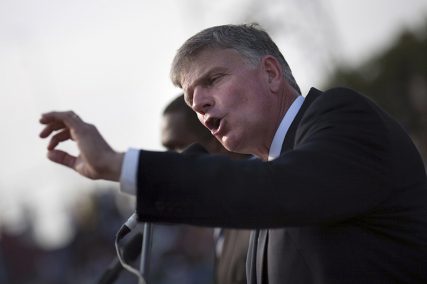 Franklin Graham, son of evangelist Billy Graham, addresses the crowd at the Festival of Hope, an evangelistic rally held at the national stadium in Port-au-Prince, on January 9, 2011. Photo courtesy of REUTERS/Allison Shelley *Editors: This photo may only be used with RNS-FRANKLIN-GRAHAM, originally transmitted on May 20, 2015 or with RNS-CRUZ-COLUMN, originally transmitted on June 9, 2015.