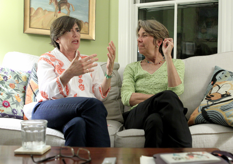 Hillary Goodridge, right, listens as Julie Goodridge talks about her hope for the future in her Boston home. Julie Goodridge and Hillary Goodridge were lead plaintiffs in the Massachusetts court case that eventually led to a 2004 decision allowing  same-sex marriage in the state. They are now divorced. Photo by Mary Schwalm, courtesy of USA Today