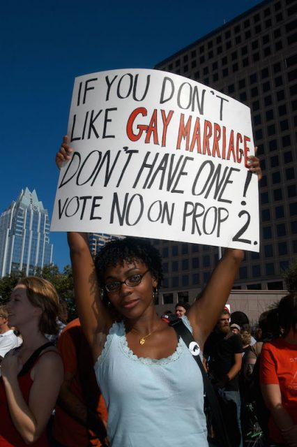 A protester holds up a placard during a rally on the steps of City Hall in Austin in 2005 to oppose a state constitutional ban on same-sex marriage, which ultimately passed. The Supreme Court could overrule that amendment in its closely watched ruling on gay marriage. Photo by Peter A. Silva/Reuters. 
*Eds: This photo can only be used with RNS-TEXAS-GAYMARRY, transmitted May 12, 2015.