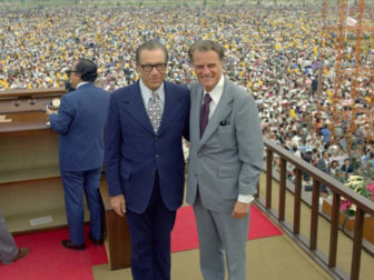 (RNS3-OCT06) George Beverly Shea (left) and evangelist Billy Graham at the 1973 crusade in Seoul, South Korea, where an estimated 1.1 million people attended the final service. Shea, now 95, won't be able to attend Graham's Kansas City, Mo., crusade due to a recent mild heart attack. See RNS-GRAHAM-SHEA, transmitted Oct. 6, 2004. Religion News Service file photo courtesy of Russ Busby/The Billy Graham Evangelistic Association.
