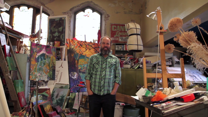 Artist Kyle Ragsdale stands in his studio at the Harrison Center for the Arts in Indianapolis. Photo by Pam Allee, courtesy of Harrison Center for the Arts