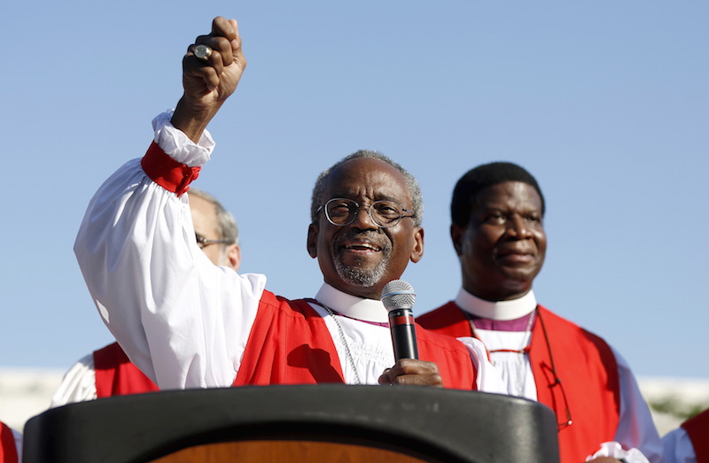Bishop Michael Curry, led marchers through the streets to protest against gun violence as part of the Episcopal Church convention in Salt Lake City, Utah June 28, 2015. Curry was elected as the first African-American presiding bishop during the General Convention of the Episcopal Church, which is held every three years in different cities around the country. Photo courtesy of REUTERS/Jim Urquhart *Editors: This photo may only be republished with RNS-RUSSELL-COLUMN, originally transmitted on July 2, 2015.