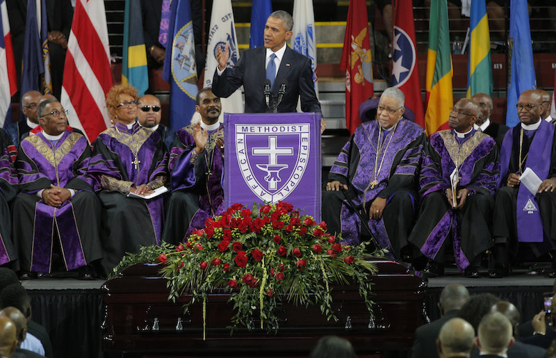 President Barack Obama speaks in front of the casket of Rev. Clementa Pinckney during funeral services for Pinckney in Charleston, South Carolina June 26, 2015.