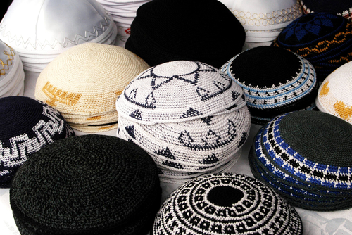 Collection of different Kippah, Kipa and Yarmulke, a hemispherical or platter-shaped cap, usually made of cloth, often worn by Jewish men. 