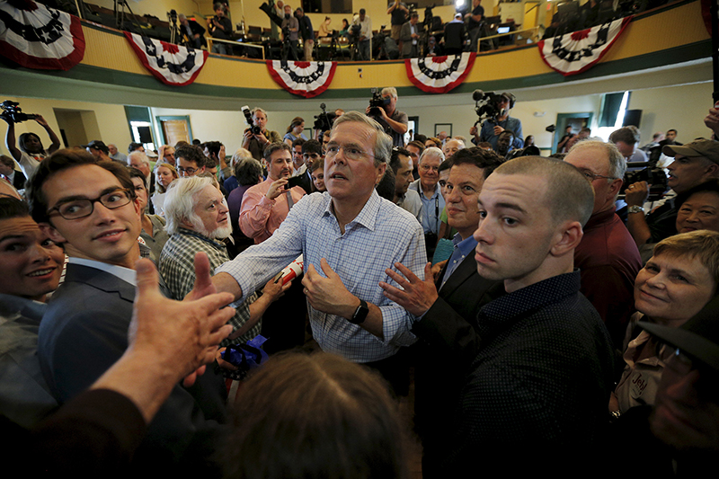 Republican presidential candidate Jeb Bush greets an audience member following a campaign town-hall meeting in Derry, New Hampshire on June 16, 2015. Photo courtesy of REUTERS/Brian Snyder
*Editors: This photo may only be republished with RNS-BUSH-POPE, originally transmitted on June 17, 2015.