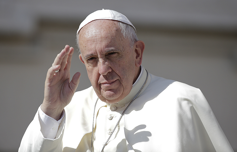 Pope Francis waves as he arrives to lead his Wednesday general audience in St. Peter's Square at the Vatican on June 17, 2015. Photo courtesy of REUTERS/Max Rossi*Editors: This photo may only be republished with RNS-POPE-ENCYCLICAL, originally transmitted on June 17, 2015 or RNS-POPE-JOBS, originally transmitted on August 19, 2015.