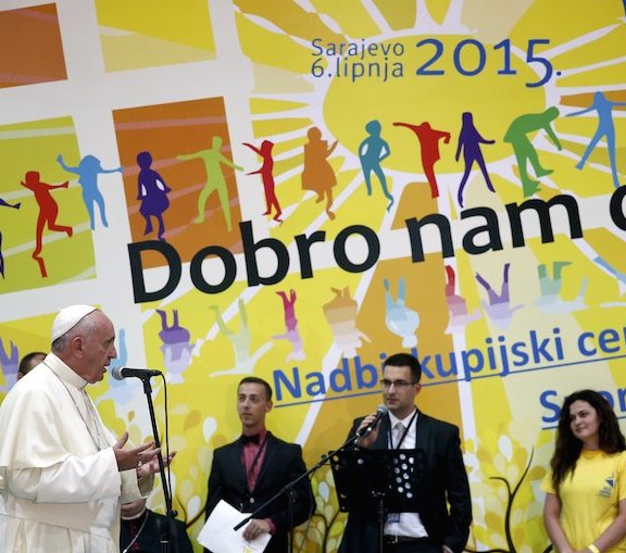 Pope Francis speaks with young people in a youth centre dedicated to Pope John Paul II during his visit to Sarajevo, June 6, 2015. REUTERS/Dado Ruvic