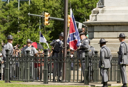 The Confederate battle flag is permanently removed from the South Carolina statehouse grounds during a ceremony in Columbia, South Carolina, July, 10, 2015