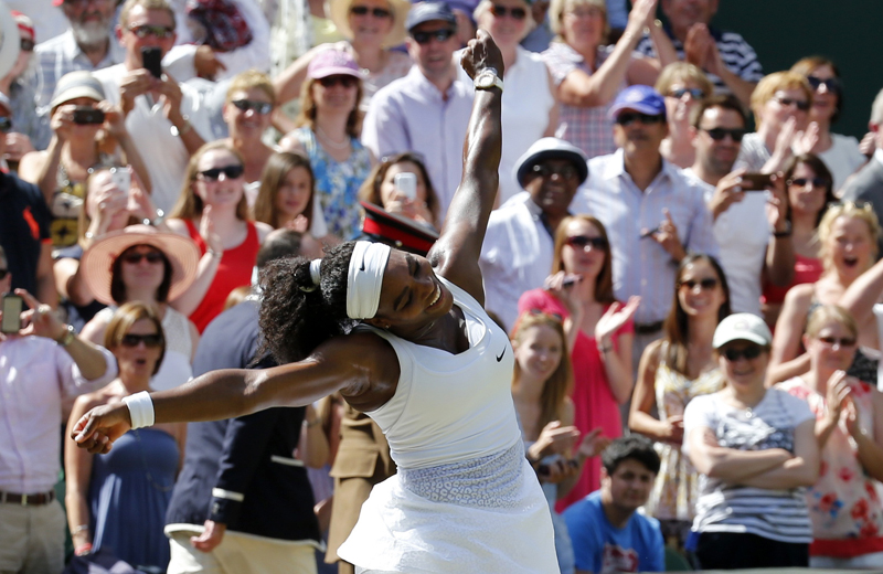 Serena Williams of the U.S.A celebrates after winning her Women's Final match against Garbine Muguruza of Spain at the Wimbledon Tennis Championships in London, on July 11, 2015. Photo courtesy of REUTERS/Suzanne Plunkett
*Editors: This photo may only be republished with RNS-SERENA-JEHOVAH, originally transmitted on July 10, 2015.